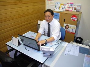 営業　富永　宏司