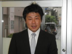 深津 健二